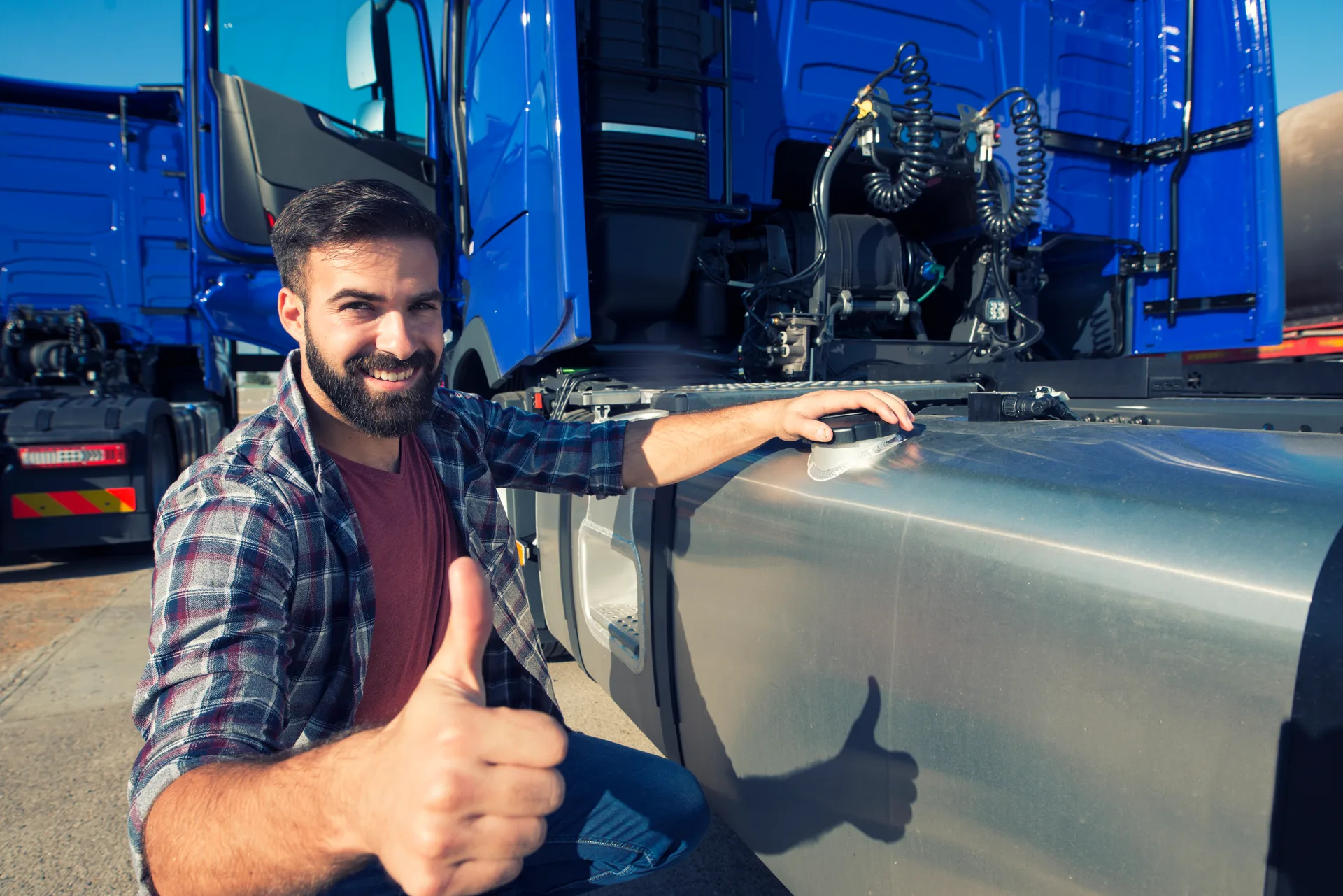 OT Transport driver ready for dispatch — professional, reliable commercial freight