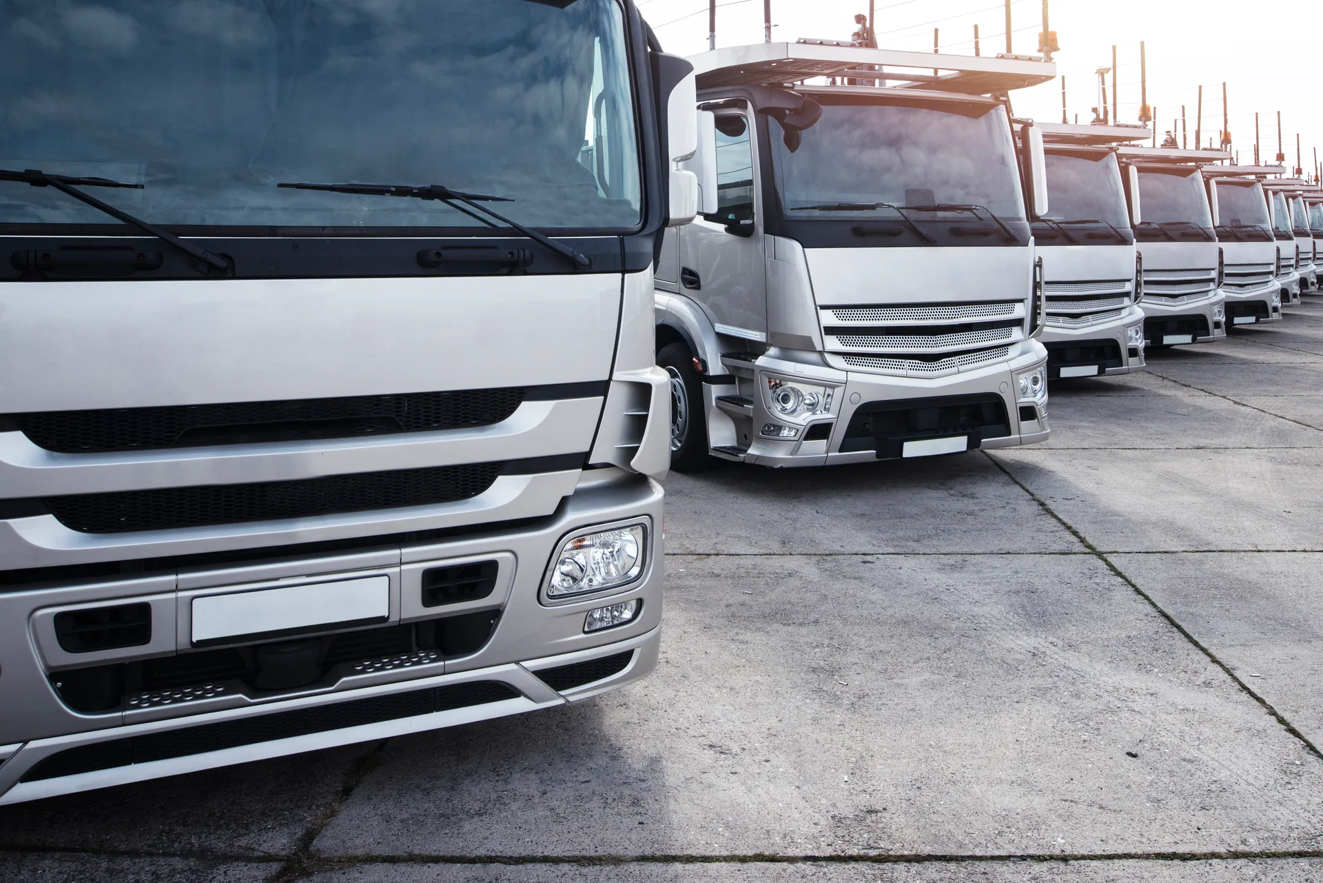 OT Transport fleet of box trucks ready for dispatch